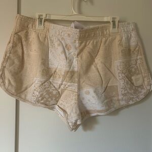 Fabletics Tan and Cream Patchwork Women Terry Dolphin Shorts